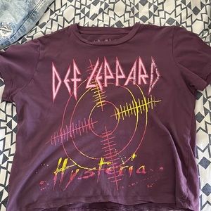 a dark purple cropped t-shirt